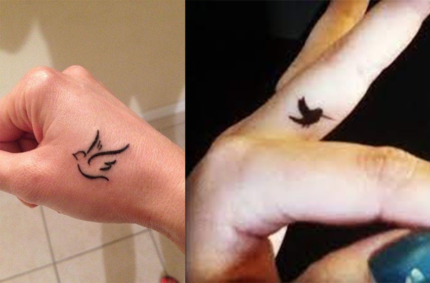 flying bird hand tattoos